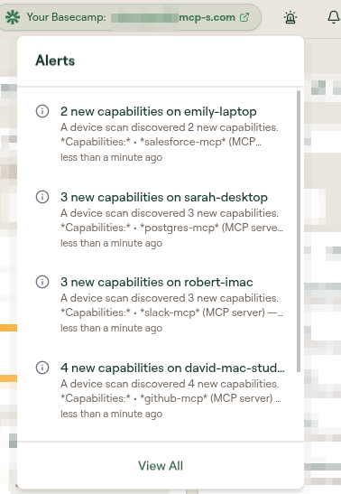 The Alerts dropdown opened from the siren icon, listing device-scan alerts with a View All link at the bottom