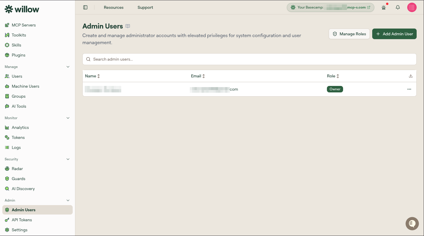 Admin Users page listing administrator accounts with Name, Email, and Role columns, a search box, and Manage Roles and Add Admin User buttons