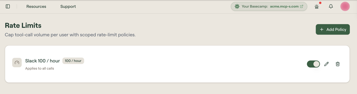 The Rate Limits page with one policy, Slack 100 / hour, showing its limit badge, an Applies to all calls scope line, and enable, edit, and delete controls